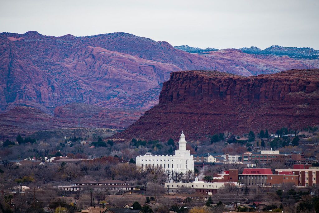 White temple and red rock mountains in St. George, Utah 