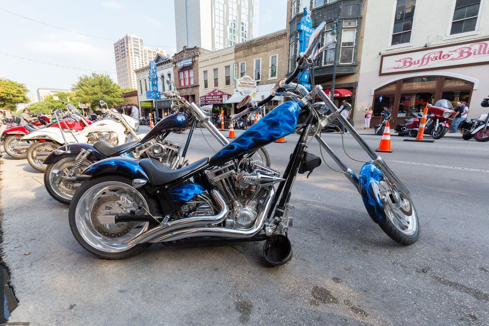 Motorcycles parked along the 6th Street in the city of Austin, in Texas, USA, during the annual Republic of Texas Motorcycle Rally 
